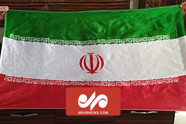 پیام یک هوادار تیم ملی: دوست دارم لباس کفنم پرچم ایران باشه